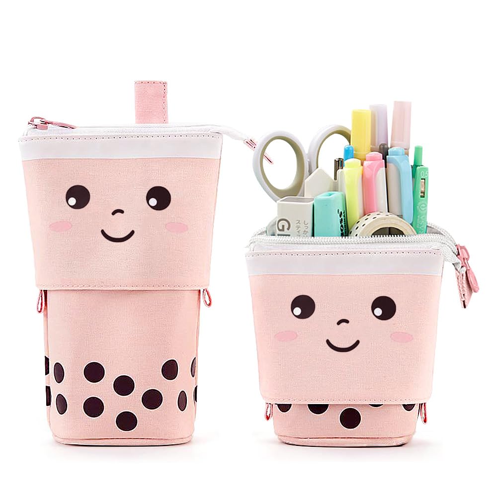 Cute pastel pink boba tea cup pencil cases on a white background, one empty and one filled with stationery supplies.